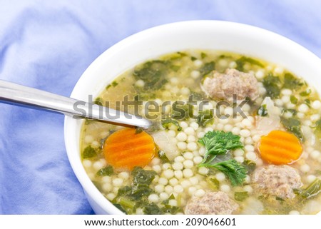 Italian wedding soup with meatballs and pepe noodles