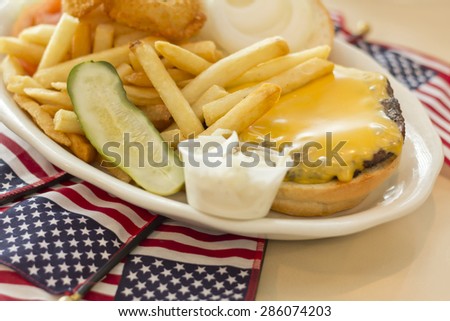 Patriotic American flag Hamburger with cheese fries and just about everything