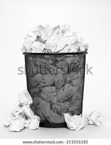 Isolated bin with crumpled paper