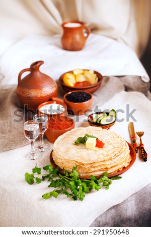 stack pancakes with red caviar and parsley butter rural rustic still life pottery canvas village vodka