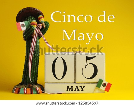 Save the date white block calendar for Cinco de Mayo, May 5, with fun Mexican cactus and flags against a yellow background.