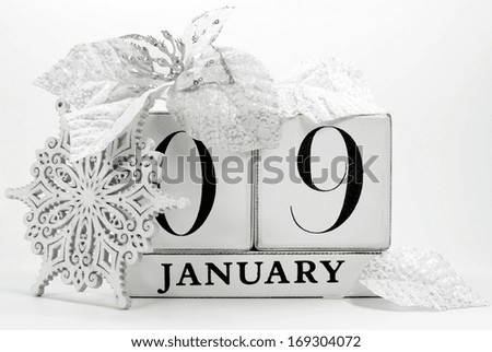Save the Date vintage shabby chic wood block calendar with white winter theme snow covered pine tree, snowflake, and poinsettia flowers, for birthdays, weddings, or website events, for January 9