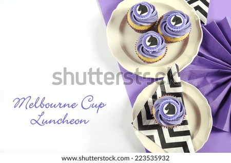 Black and white chevron with purple theme party luncheon table place setting for Melbourne Cup, Australian public holiday, horse race event cupcakes with closeup and sample text.