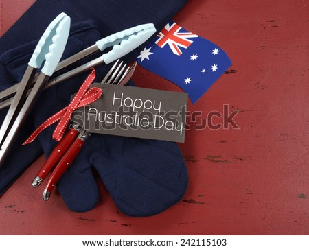 Happy Australia Day, January 26, theme red, white and blue barbeque setting on dark red vintage wood background.