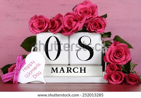 International Womens Day white vintage wood block calendar date for MArch 8, with roses on pink and red vintage wood background.