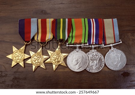 ADELAIDE, AUSTRALIA - APRIL 2, 2014: Original Australian Army World War II medals with the 1939 - 1945 Star, Africa Star, Pacific Star, Defence Medal, 1939 -1945 Medal and Australian Service Medal.