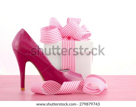 Pink high heel shoe on pink wood shabby chic table with Start Each Day Like Your Birthday quote.