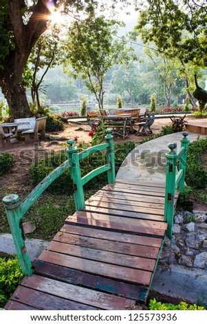 Bridge wood in garden table