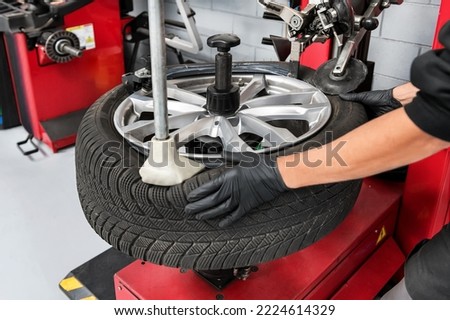 Similar – Image, Stock Photo Crop faceless mechanic working with drilling machine in factory