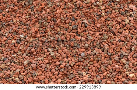 Background texture of expanded clay pellets made from natural clay fired at temperatures over 1000 degrees, used in hydroponics and as thermal insulation
