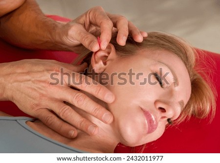 Similar – Image, Stock Photo Male therapist doing procedures with client in clinic