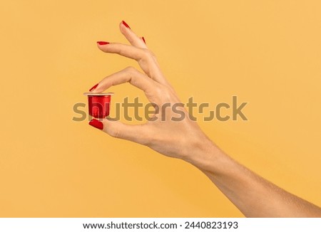 Similar – Image, Stock Photo Anonymous woman with disposable cup of coffee sitting on street bench