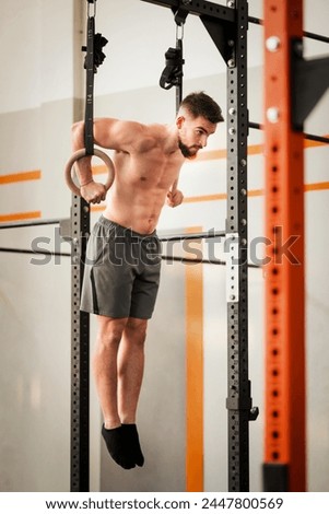 Similar – Image, Stock Photo Strong sportsman during intense training