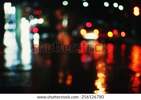 blurred photo background, road red lights, rainy night