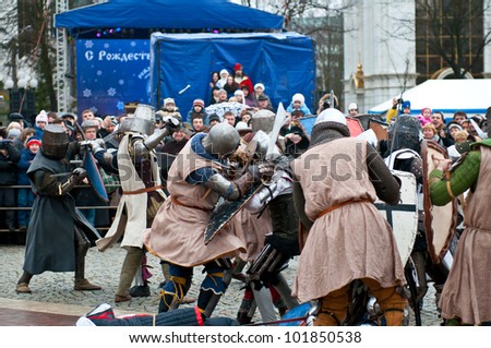 KALININGRAD, RUSSIA - JANUARY 8: A group of unidentified men participate in a historical reconstruction knightly battle, Battle of Lake Peipus, January 8, 2012 in Kaliningrad, Russia