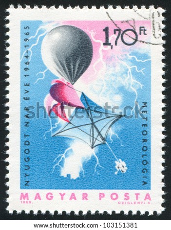 HUNGARY  CIRCA 1965: stamp printed by Hungary, shows Weather balloon and lightning, meteorology, circa 1965