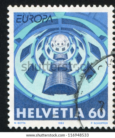 SWITZERLAND - CIRCA 1993: stamp printed by Switzerland, shows Contemporary Architecture: Media House, Villeurbanne, France, circa 1993