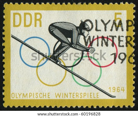 GERMANY- CIRCA 1963: stamp printed by Germany, shows Ski jump and olympic rings, circa 1963.