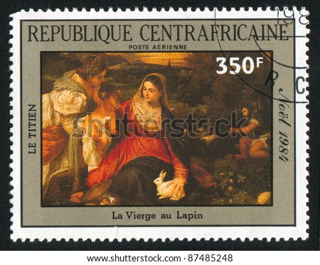 CENTRAL AFRICAN REPUBLIC - CIRCA 1985: A stamp printed by Central African Republic, shows Painting by Titian, Virgin with Rabbit, circa 1985