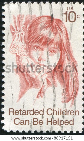 UNITED STATES - CIRCA 1974: A stamp printed by United States, shows a retarded girl touching woman hand, circa 1974