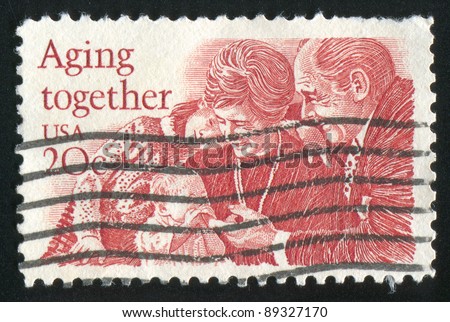 UNITED STATES - CIRCA 1982: stamp printed by Umited States, shows Old Couple with Grandchildren, circa 1982