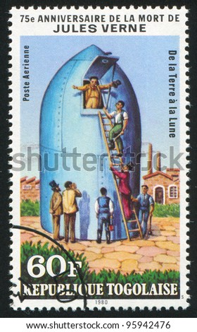 TOGO - CIRCA 1980: A stamp printed by Togo, shows From Earth to Moon, by Jules Verne, circa 1980