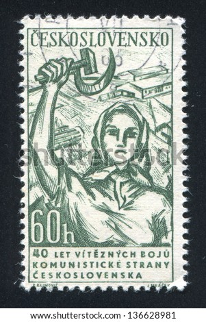CZECHOSLOVAKIA - CIRCA 1961: stamp printed by Czechoslovakia, shows Woman with Hammer and Sickle, circa 1961