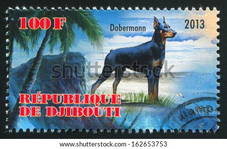 DJIBOUTI - CIRCA 2013: stamp printed by Djibouti, shows Dobermann dog, circa 2013