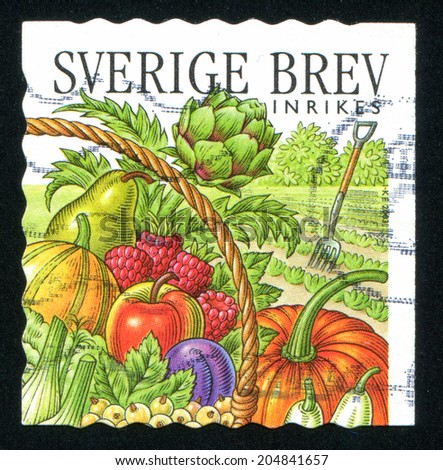 SWEDEN - CIRCA 2003: stamp printed by Sweden, shows Pitchfork, artichoke, pear, gourd, raspberries, apple, plum, pumpkin, eggplant, circa 2003