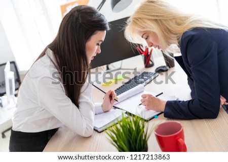 Girls standing bent over firmly Girls standing bent over think