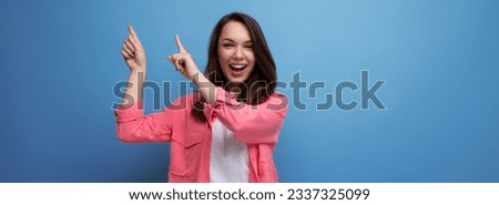 Similar – Image, Stock Photo Pretty brunette, long-haired young woman, teenager, teenager smiles naturally into the camera, in front of a grey wall on vacation. Happy girl with blue eyes, in front of a rock by the sea, on the beach during the summer holidays, looking forward to holidays and summer fun.