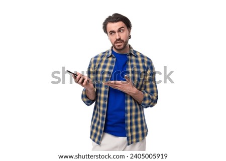 Similar – Image, Stock Photo Brutal man browsing smartphone in backyard