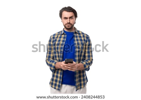 Similar – Image, Stock Photo Brutal man browsing smartphone in backyard