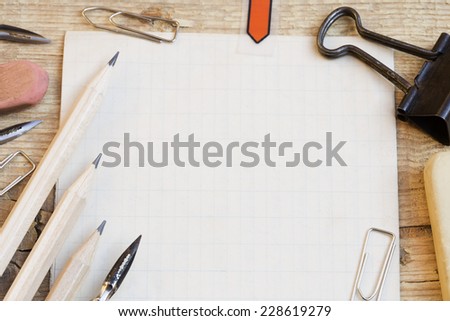 Writing equipments on a vintage paper