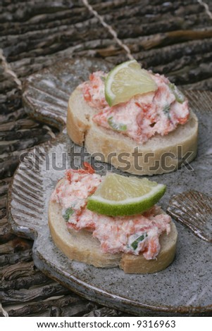 Tasty smoked salmon snack on a toasted bagget