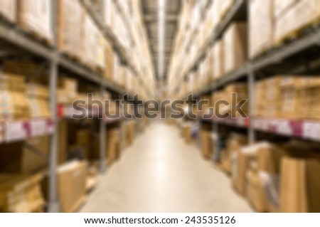Blur image of a warehouse with multi layer shelves