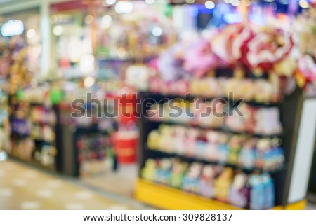 Blurred image of a convenience store in shopping mall
