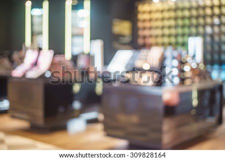 Blurred images of a cosmetic store in shopping mall