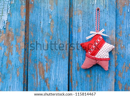 holiday star on blue woody background