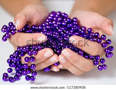 Women hands holding a jewelry