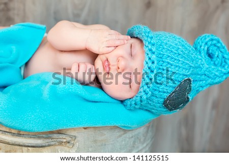 The sweet dream of newborn in turquois hat
