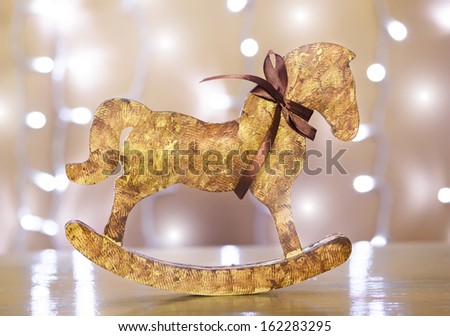Cute Christmas toy of wood in the shape of a horse