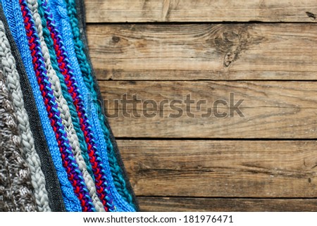 The set of different kind of fabric on a woody background