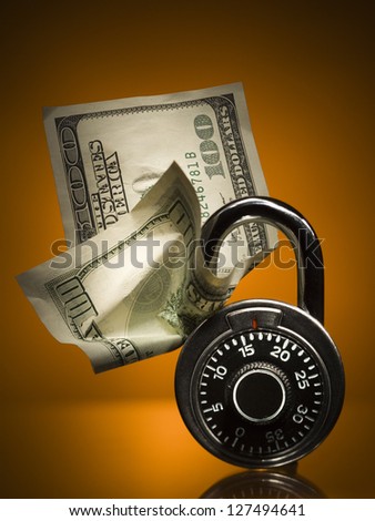 Combination lock with hundred dollar bill