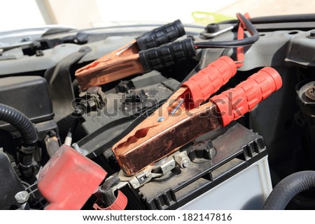 Charging battery car with electricity trough jumper cables