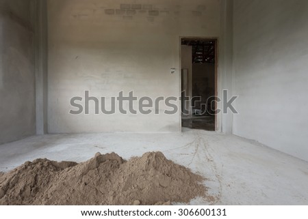 pile sand in construction site prepared mix cement concrete for plaster wall and floor