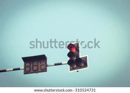 traffic light red with vintage sky background