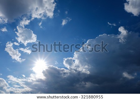 clear weather sky, sun on blue sky with clouds, sun rays, solar of clean energy power