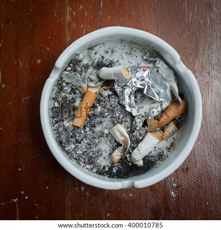 Similar – Image, Stock Photo Ashtray with cigarettes