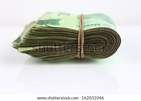 Big stack of Cash. Isolated on white background